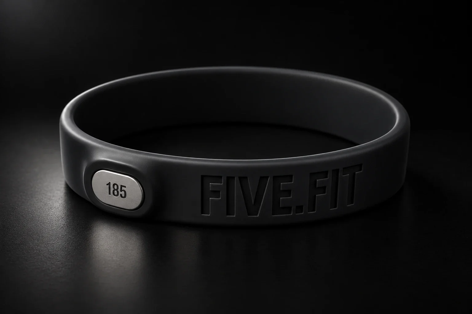 Charcoal black FIVE.FIT silicone bracelet with a stainless steel goal pebble engraved 185